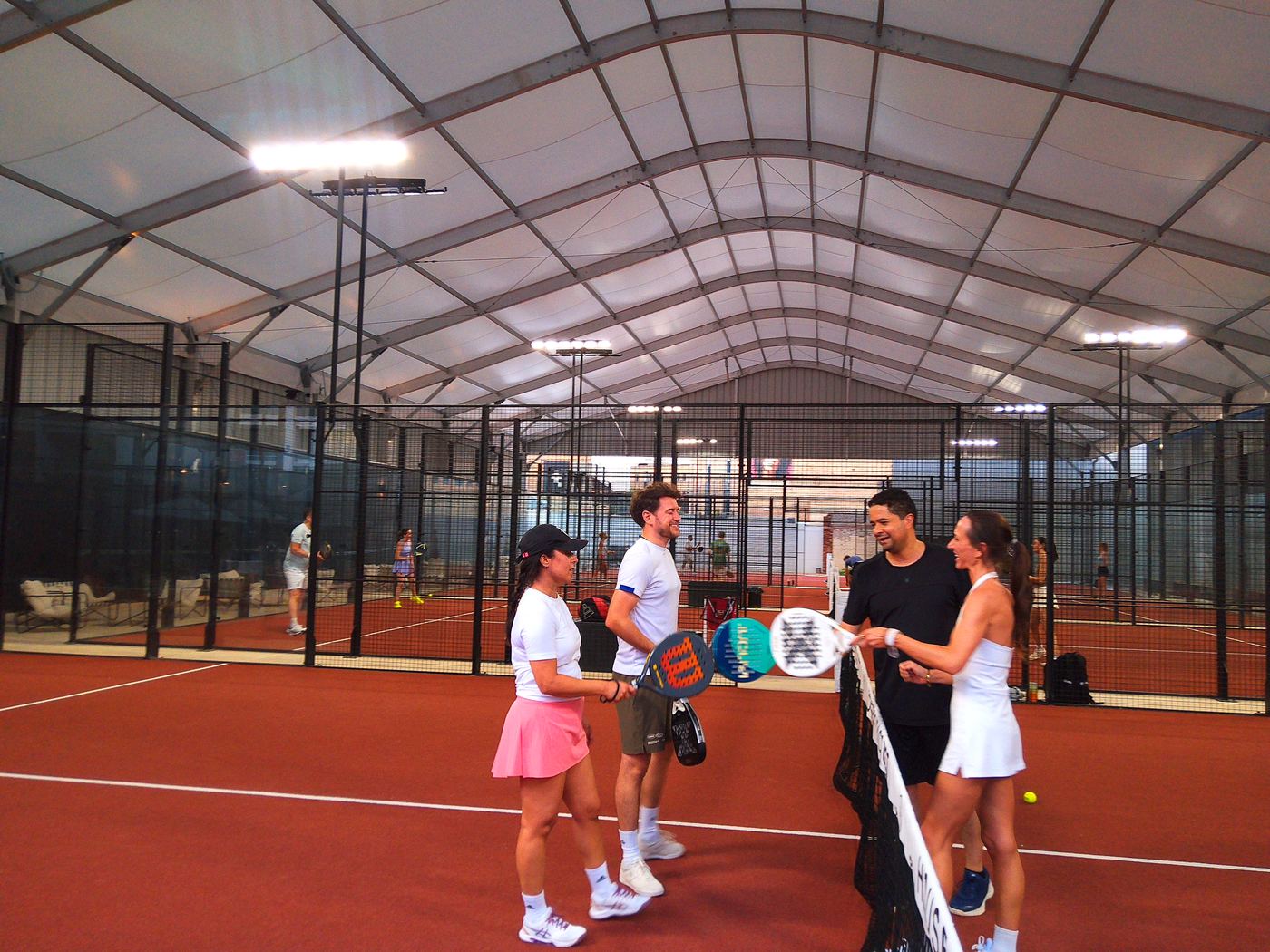 Players meeting at the net before a match